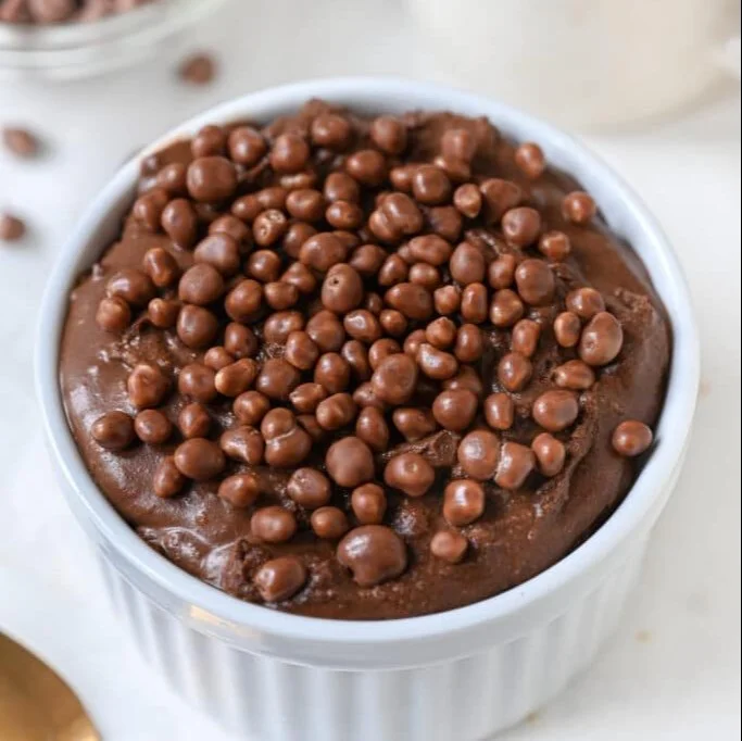 Bowl of Greek Yogurt Chocolate Pudding topped with chocolate shavings