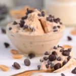 Bowl of Greek Yogurt Cookie Dough with chocolate chips and nuts