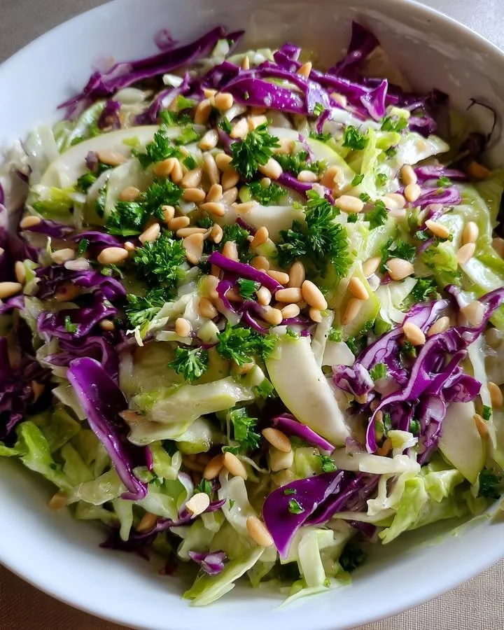 Fresh Green Apple & Cabbage Crunch Salad with dressing and toppings