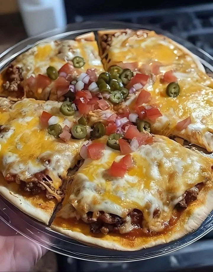 Homemade Mexican Pizza topped with fresh ingredients and spices