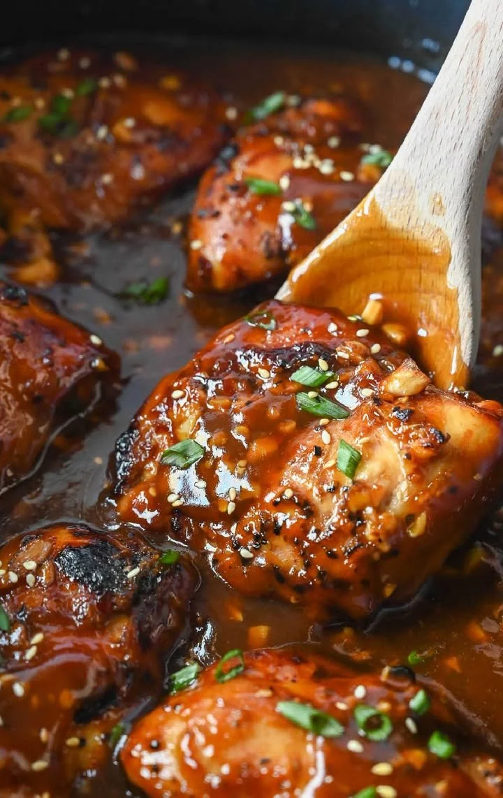 Honey Garlic Slow Cooker Chicken served on a plate with garnish