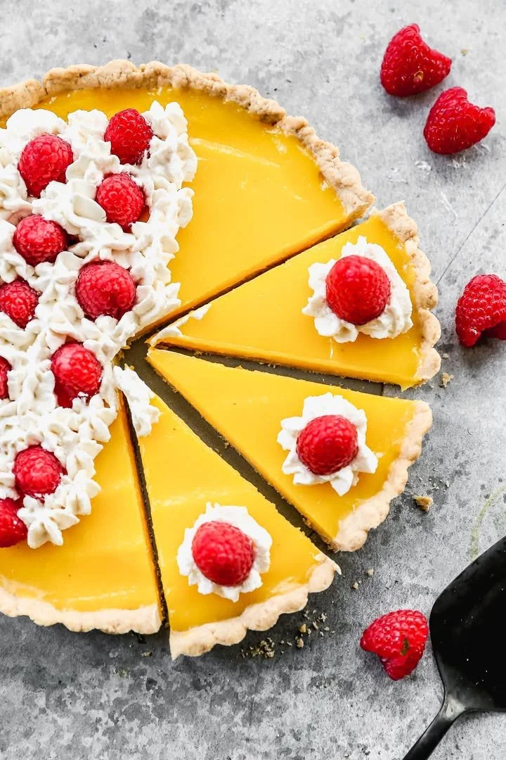Delicious lemon dessert showcasing a bright, citrusy treat garnished with lemon slices.