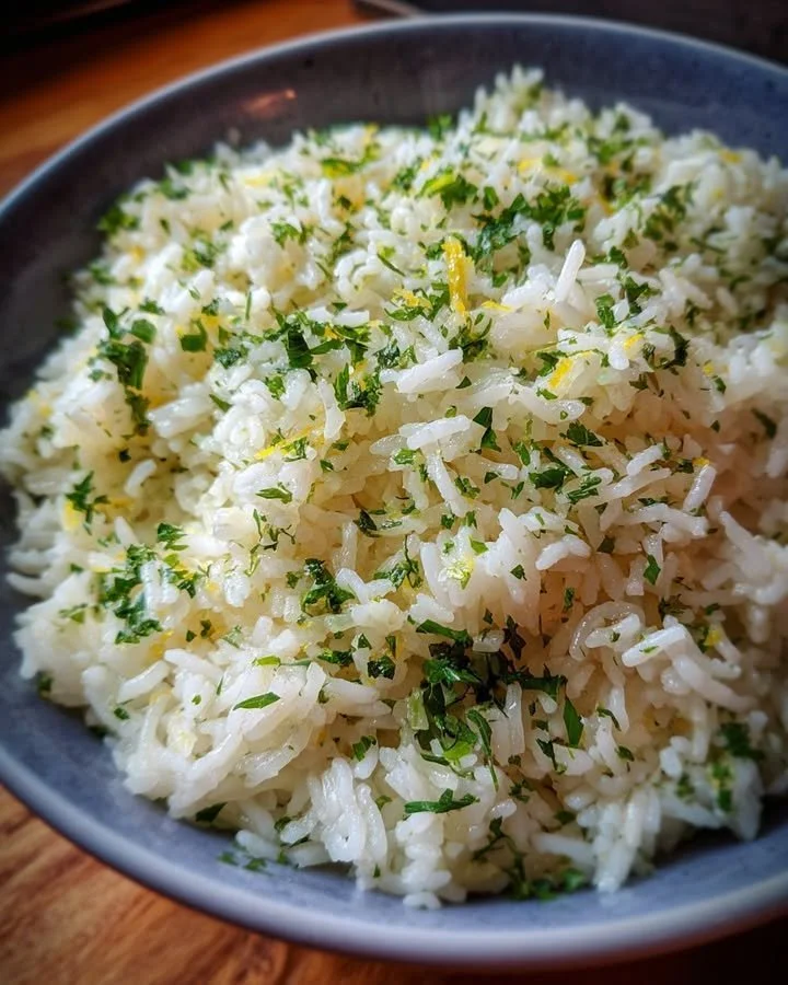 Delicious Lemon Herb Rice garnished with fresh herbs and lemon zest.