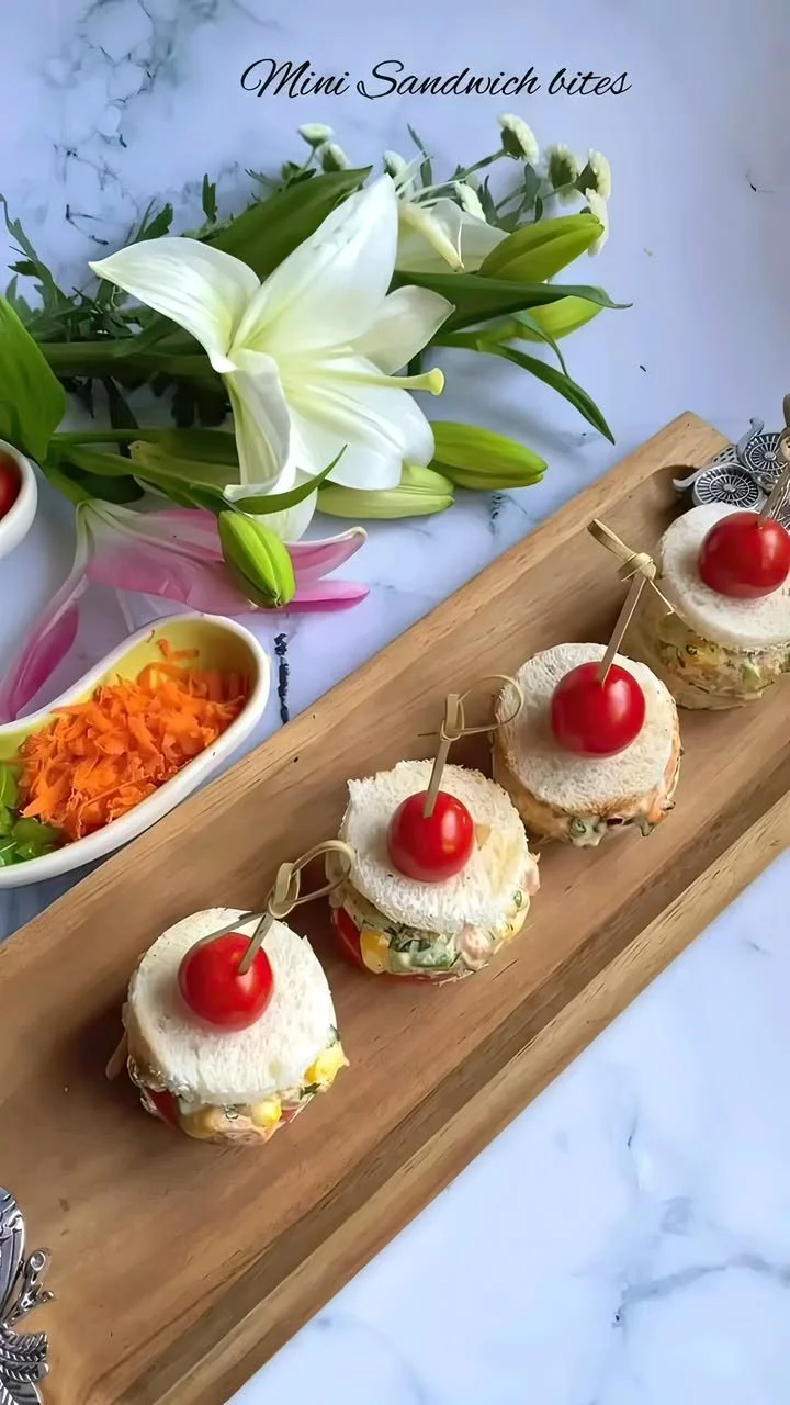 Assorted mini sandwich bites ready for serving at a party