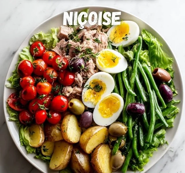 Fresh and colorful Nice Salad with mixed vegetables and dressing