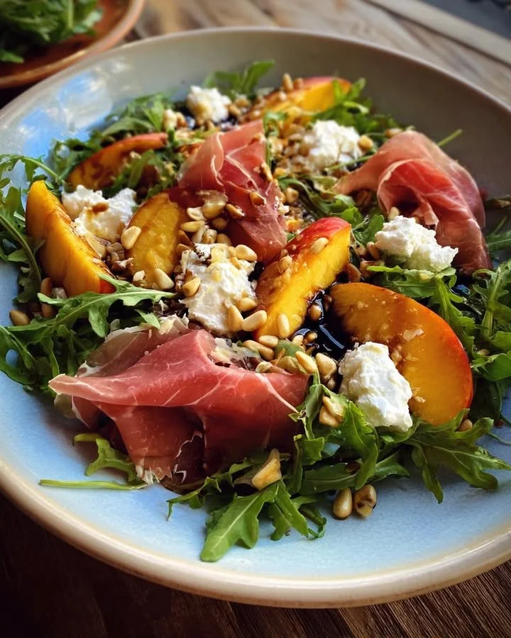 Peach Salad with prosciutto, arugula, and a lemon vinaigrette dressing