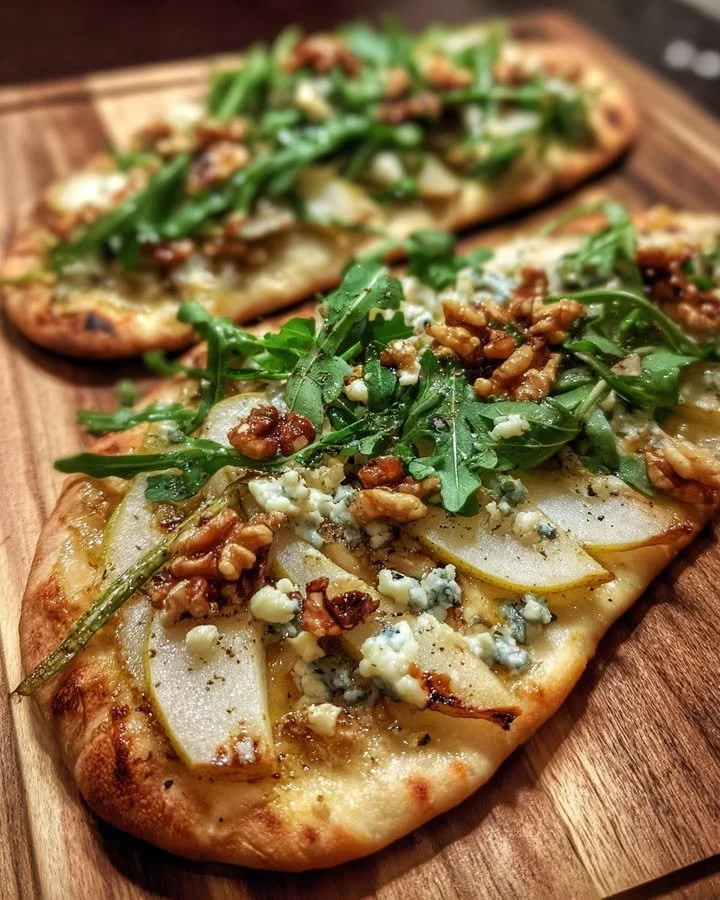 Delicious Pear and Gorgonzola Flatbread topped with fresh ingredients