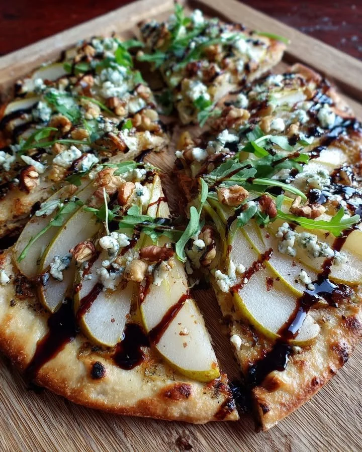Delicious Pear, Gorgonzola and Walnut Flatbread topped with balsamic glaze