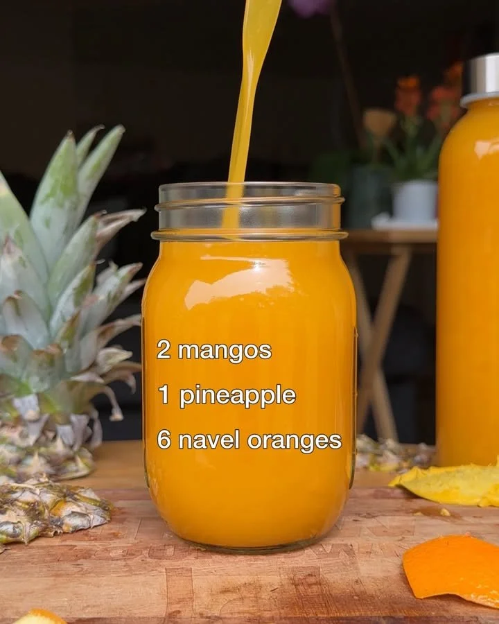Refreshing Pineapple Mango Orange Juice in a glass with fresh fruit