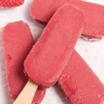 Colorful protein popsicles arranged on a tray, ideal for a healthy snack.