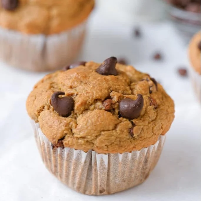 Healthy homemade Pumpkin Protein Muffins ready to be enjoyed for breakfast.