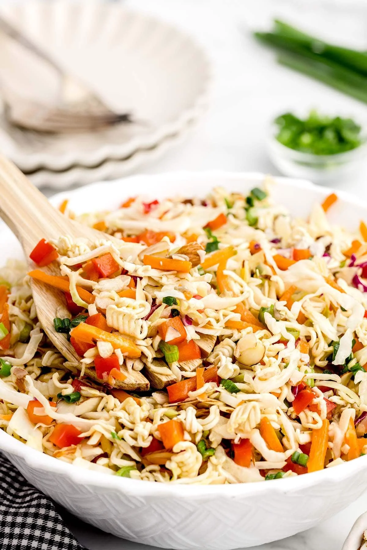 A vibrant Ramen Noodle Salad with colorful vegetables and sesame dressing.