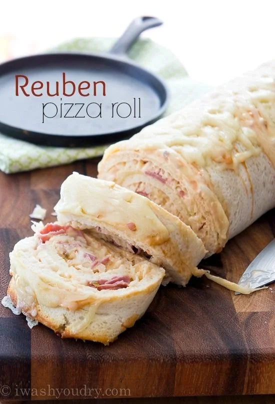 Freshly baked Reuben Pizza Roll with corned beef, sauerkraut, and cheese.