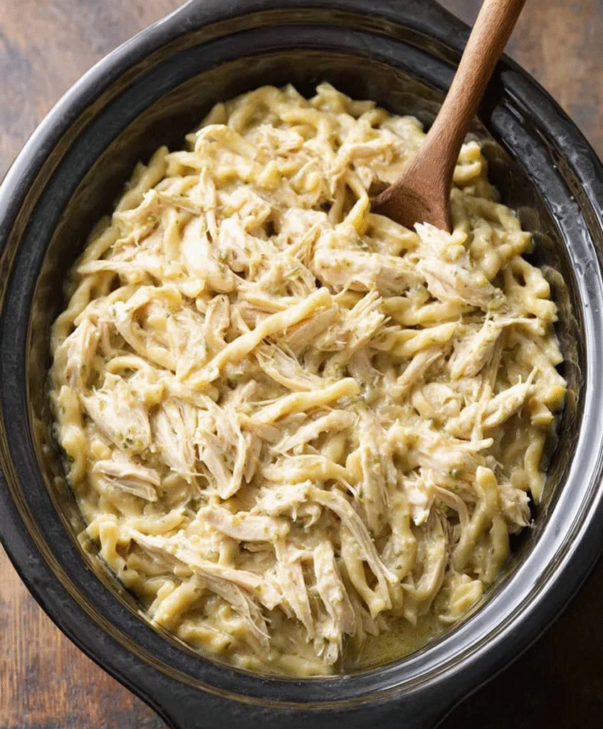 Delicious slow cooker Amish chicken served with noodles in a bowl