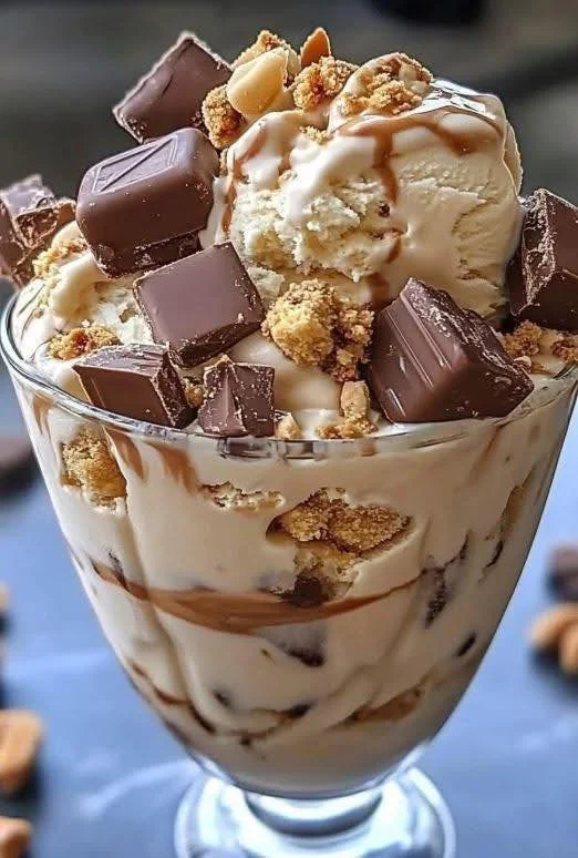 Snickers and Reese's cookie dough ice cream in a bowl