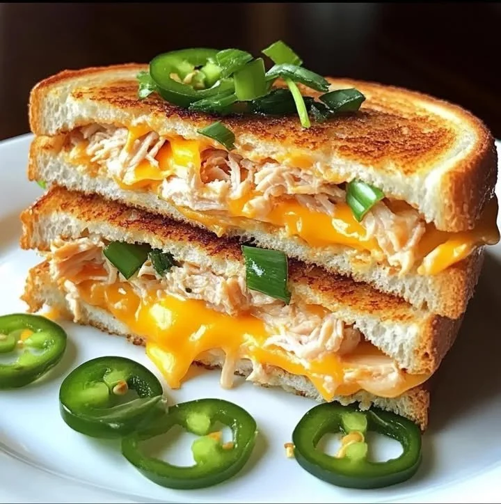 Spicy Jalapeño Tuna Melt with melted cheese and jalapeños on toasted bread