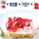 Delicious strawberry cheesecake bars topped with fresh strawberries.