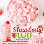 Bowl of creamy strawberry fluff dessert with fresh strawberries on top