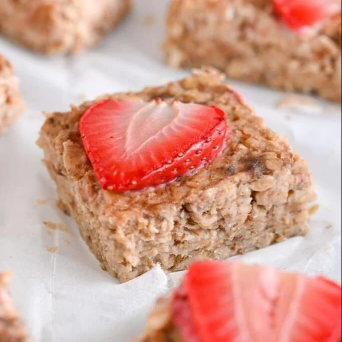 Delicious homemade Strawberry Oatmeal Bars on a plate.
