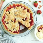 Homemade Strawberry-Rhubarb Pie with a flaky crust and vibrant filling.