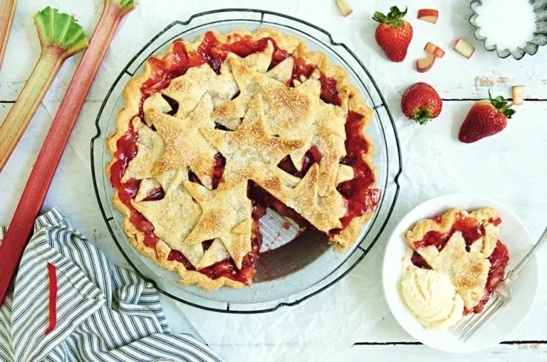 Homemade Strawberry-Rhubarb Pie with a flaky crust and vibrant filling.