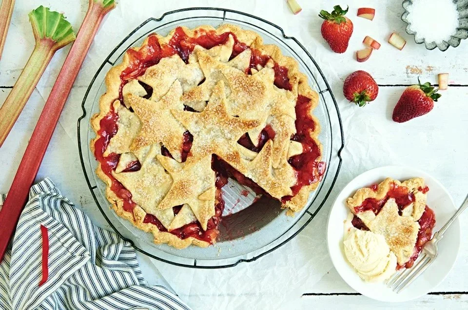 Homemade Strawberry-Rhubarb Pie with a flaky crust and vibrant filling.