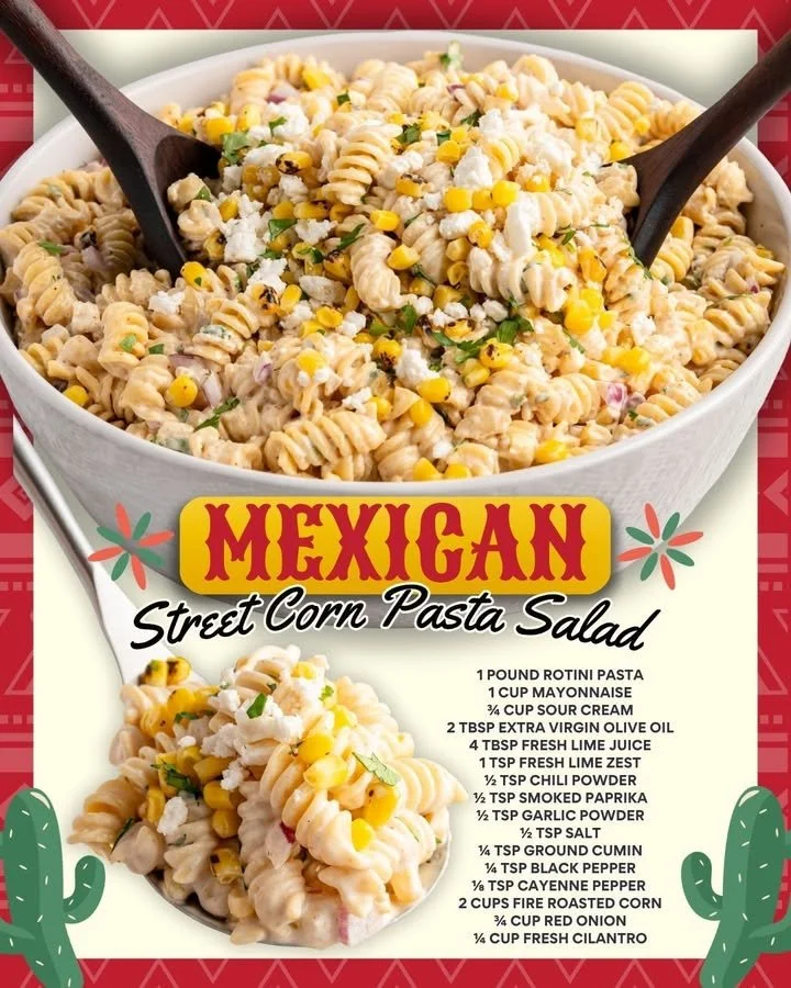 Bowl of colorful Street Corn Pasta Salad, garnished with cilantro and lime.