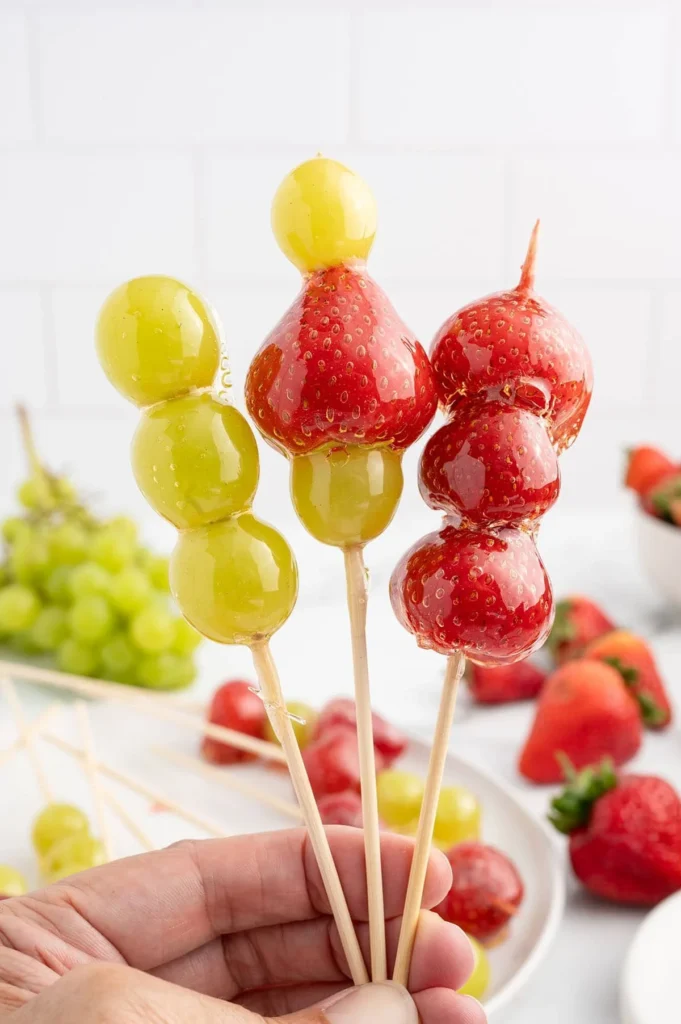 Tanghulu - traditional Chinese candied fruits on a stick, vibrant and delicious.