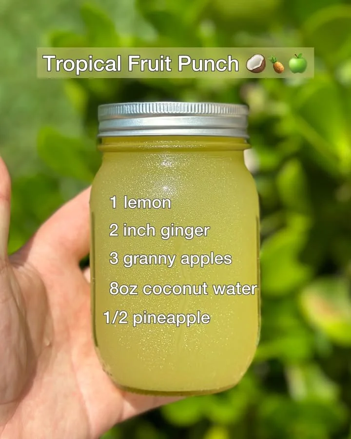 Refreshing Tropical Fruit Punch served in a glass with colorful fruits