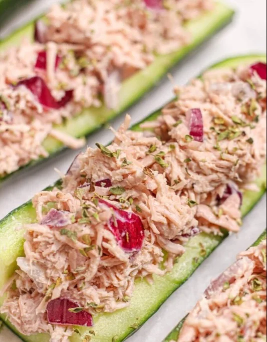 Delicious tuna cucumber boats topped with fresh ingredients for a healthy snack.