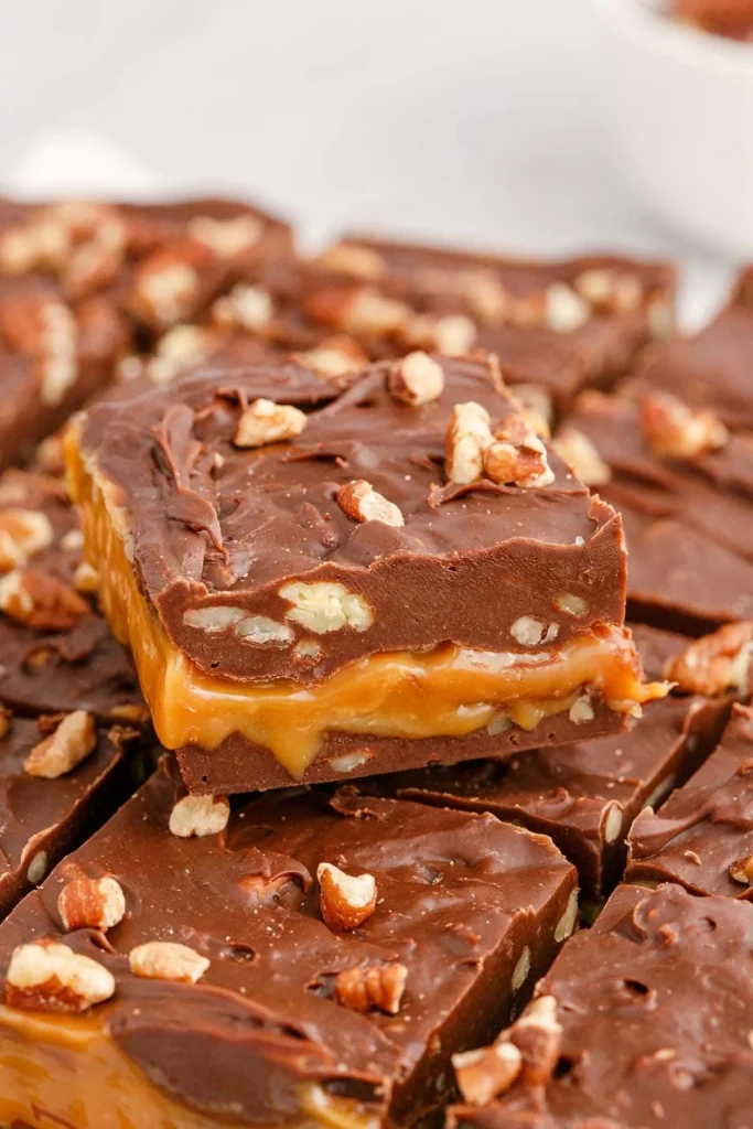Delicious Turtle Fudge made with chocolate, caramel, and nuts.