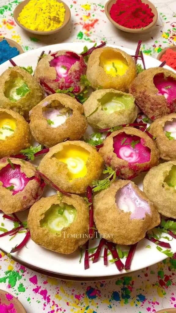 Delicious Dahi Puri garnished with colorful toppings for Holi celebration