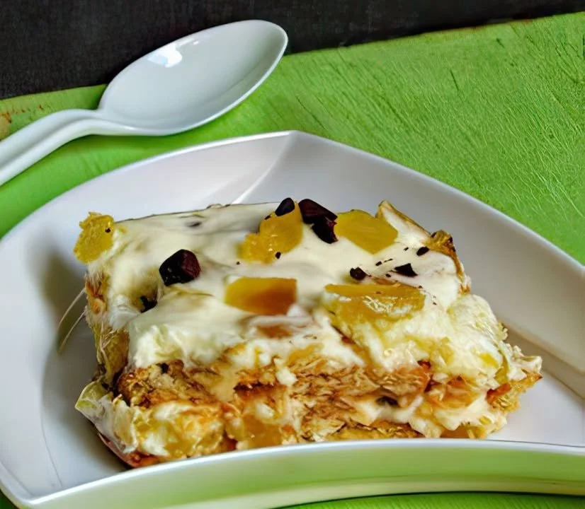 Delicious homemade pineapple pudding topped with fresh pineapple slices