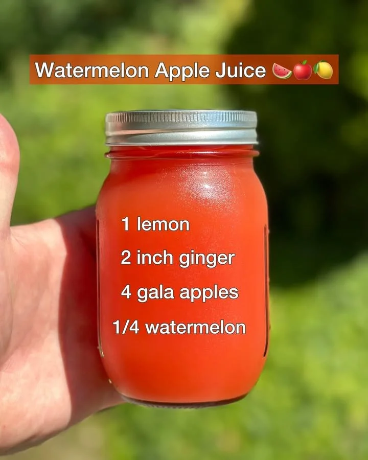 Refreshing watermelon apple juice in a glass with ice and mint leaves