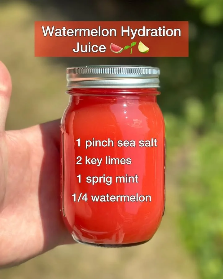 Glass of watermelon hydration juice garnished with mint leaves