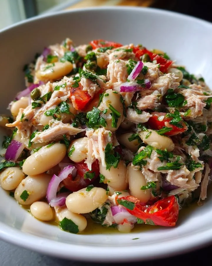 A vibrant bowl of White Bean & Tuna Salad full of fresh ingredients
