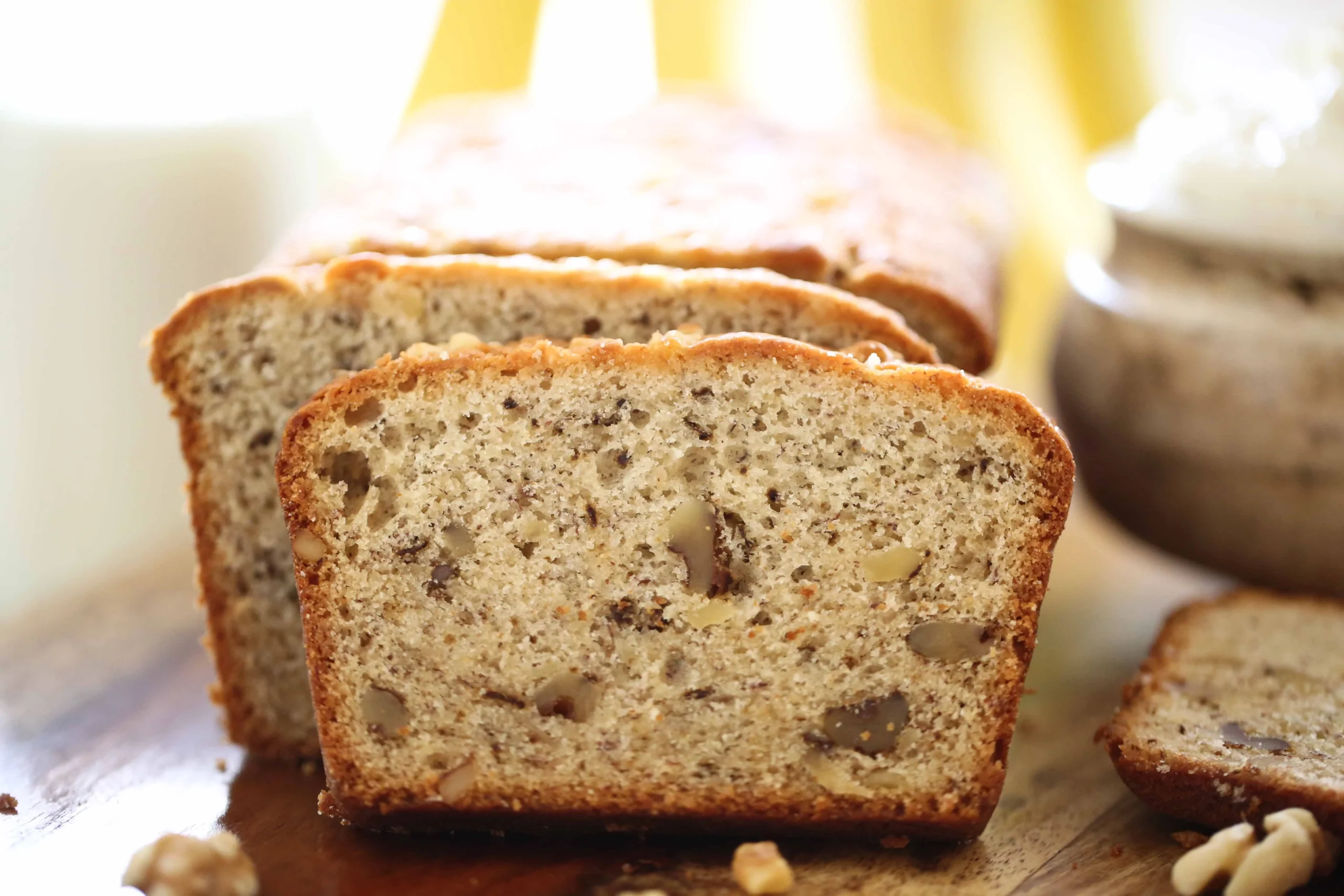 Delicious banana bread topped with cream cheese icing, perfect for a sweet treat.