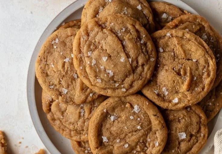 Deliciously soft and gooey chewy cookies arranged on a plate