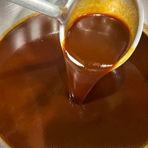 Bottle of Bold & Smoky BBQ Sauce ready for grilling and barbecuing