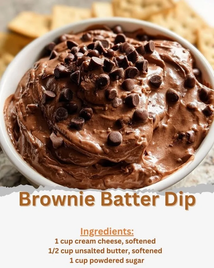 Creamy brownie batter dip served with graham crackers and strawberries.