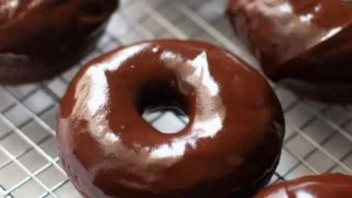 Delicious chocolate donuts with a glossy chocolate glaze.