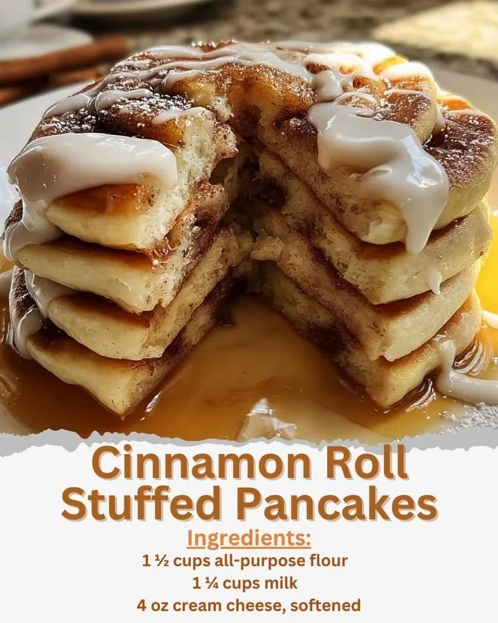 Cinnamon roll stuffed pancakes stacked with icing and cinnamon sugar on top