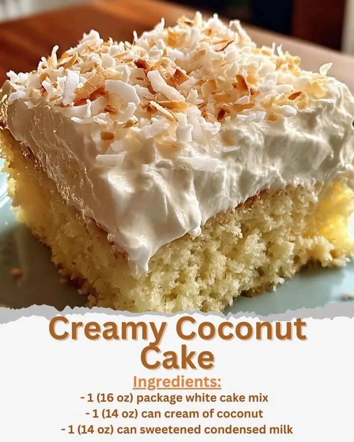 Delicious creamy coconut cake topped with fresh coconut flakes