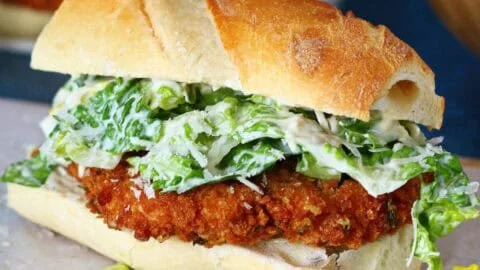 Crispy Chicken Caesar Sandwich with fresh greens and Caesar dressing