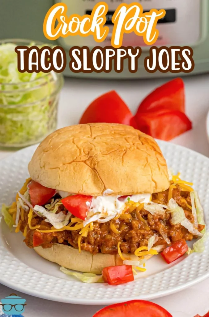 Delicious Crock Pot Taco Sloppy Joes served with toppings on a plate.