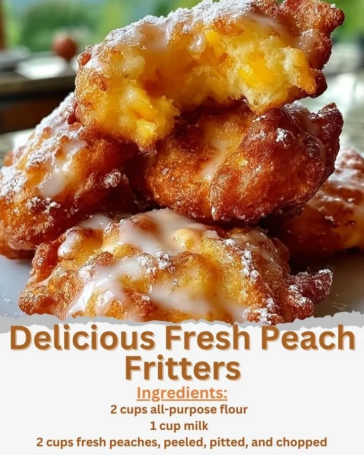 Freshly made peach fritters dusted with powdered sugar