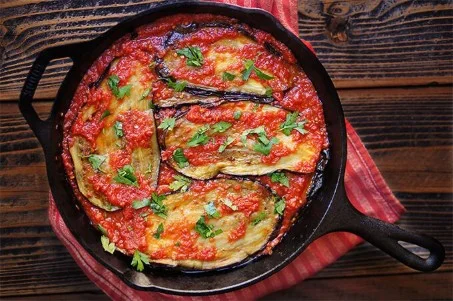 Delicious eggplant dish with homemade tomato garlic sauce served on a plate