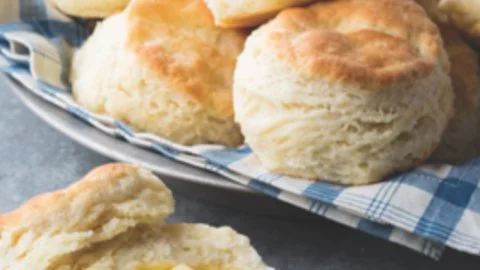 Fluffy buttermilk biscuits baked to golden perfection, perfect for any meal.