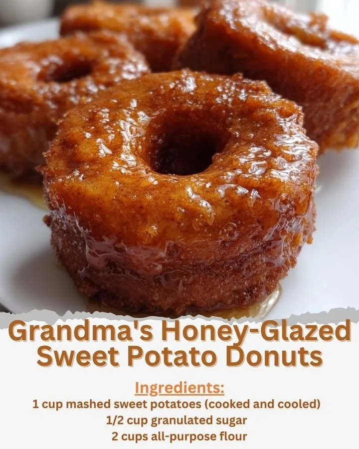 Delicious honey-glazed sweet potato donuts on a rustic wooden table
