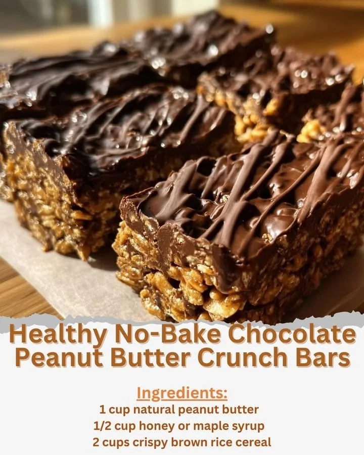 Healthy no-bake chocolate peanut butter crunch bars on a wooden table